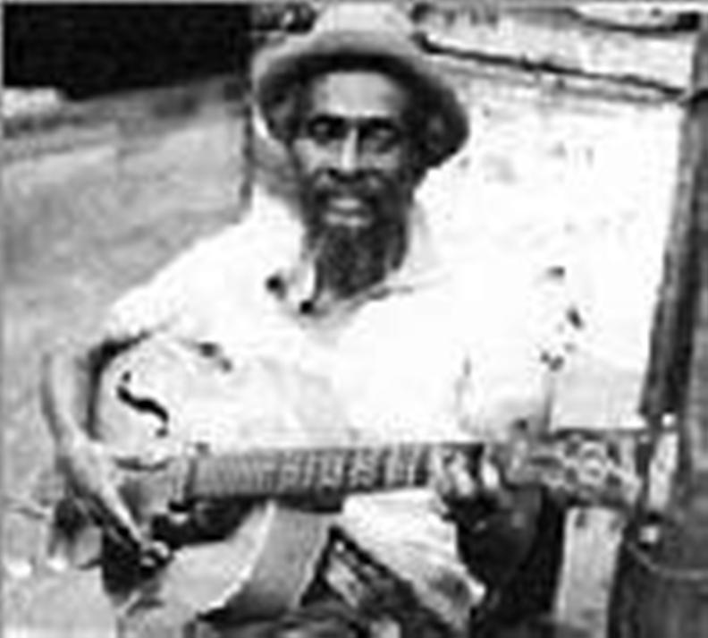 Jah Jerry Haynes  musing with guitar